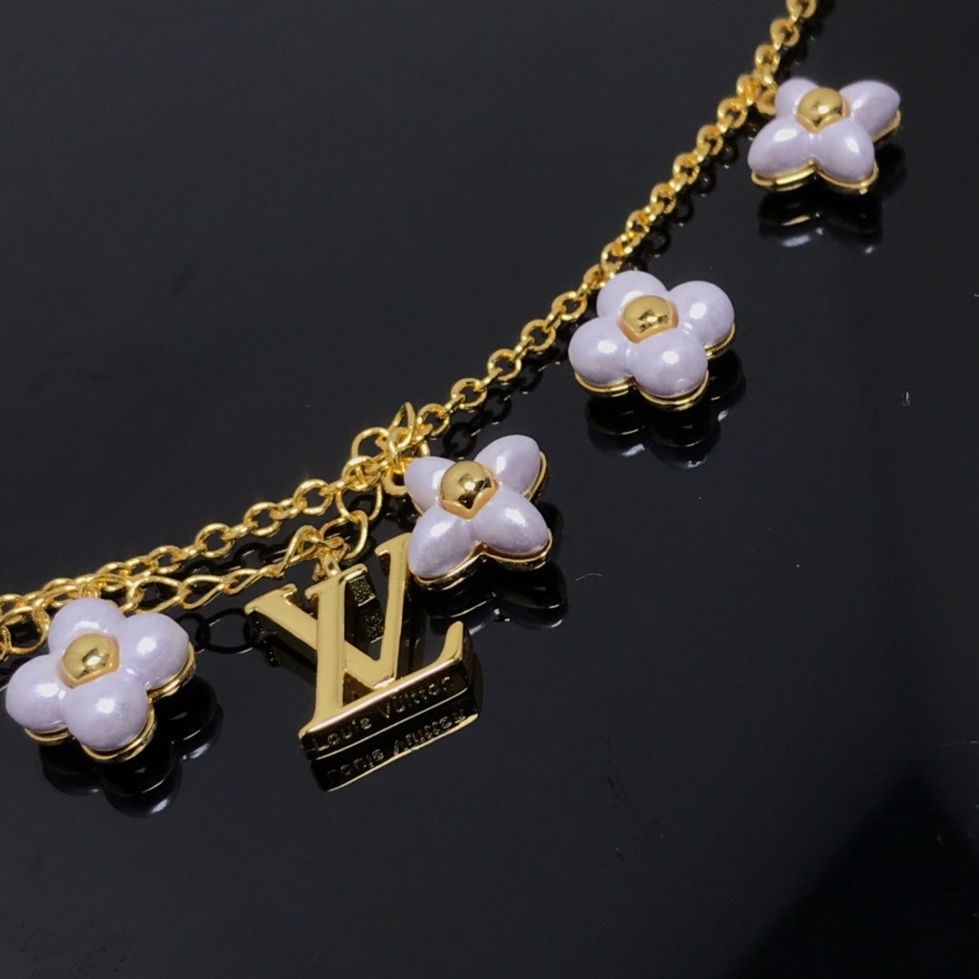[Perla Lux]LOGO 6 MOTIF STAR AND SUN GOLD BRACELET