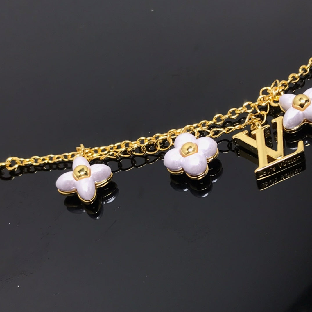 [Perla Lux]LOGO 6 MOTIF STAR AND SUN GOLD BRACELET