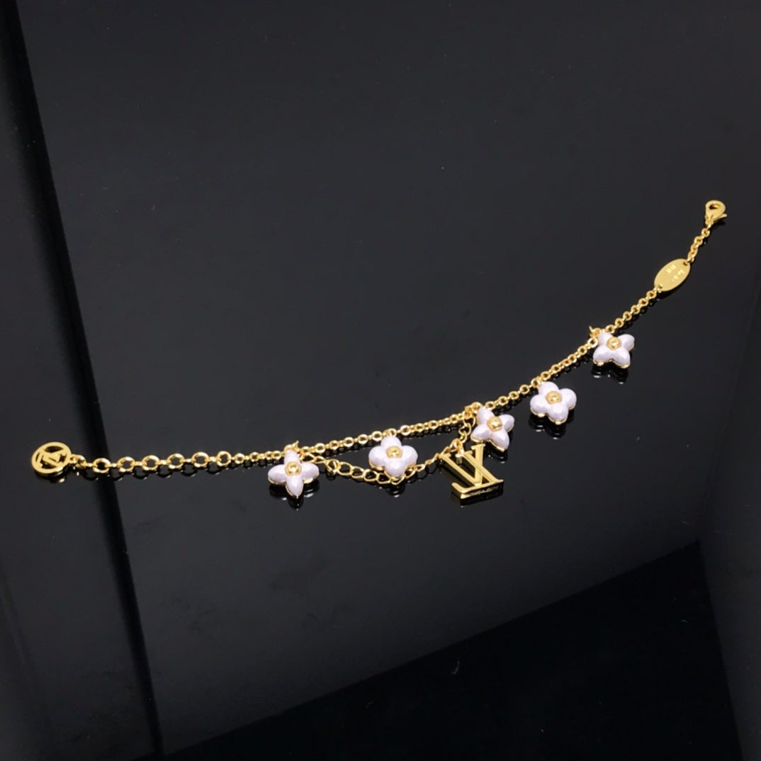 [Perla Lux]LOGO 6 MOTIF STAR AND SUN GOLD BRACELET